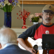 Mellifluous Dave Webb had the folks songs spinning in the Fireside Room.