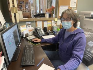 Barb Shulock at the front desk