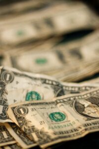 crumpled dollar bills